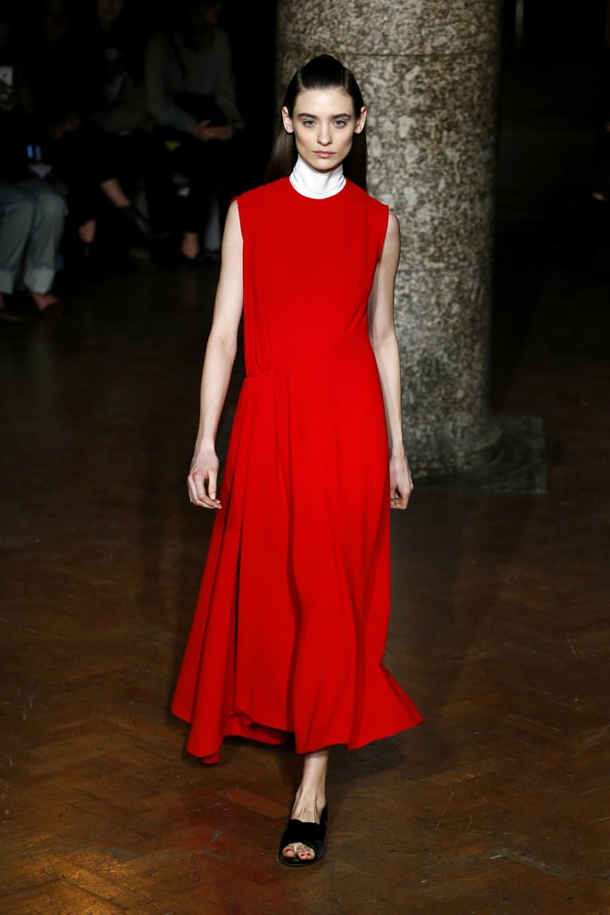 We'd love to see her try out this streamlined midi with pumps and a suede clutch.