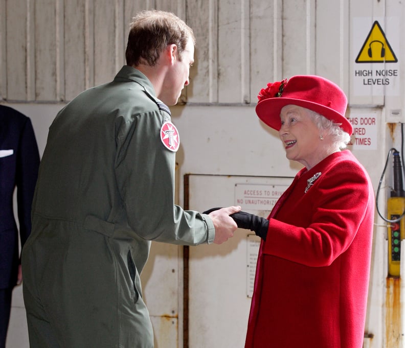 Queen Elizabeth II visits Prince William at RAF Valley in 2011.