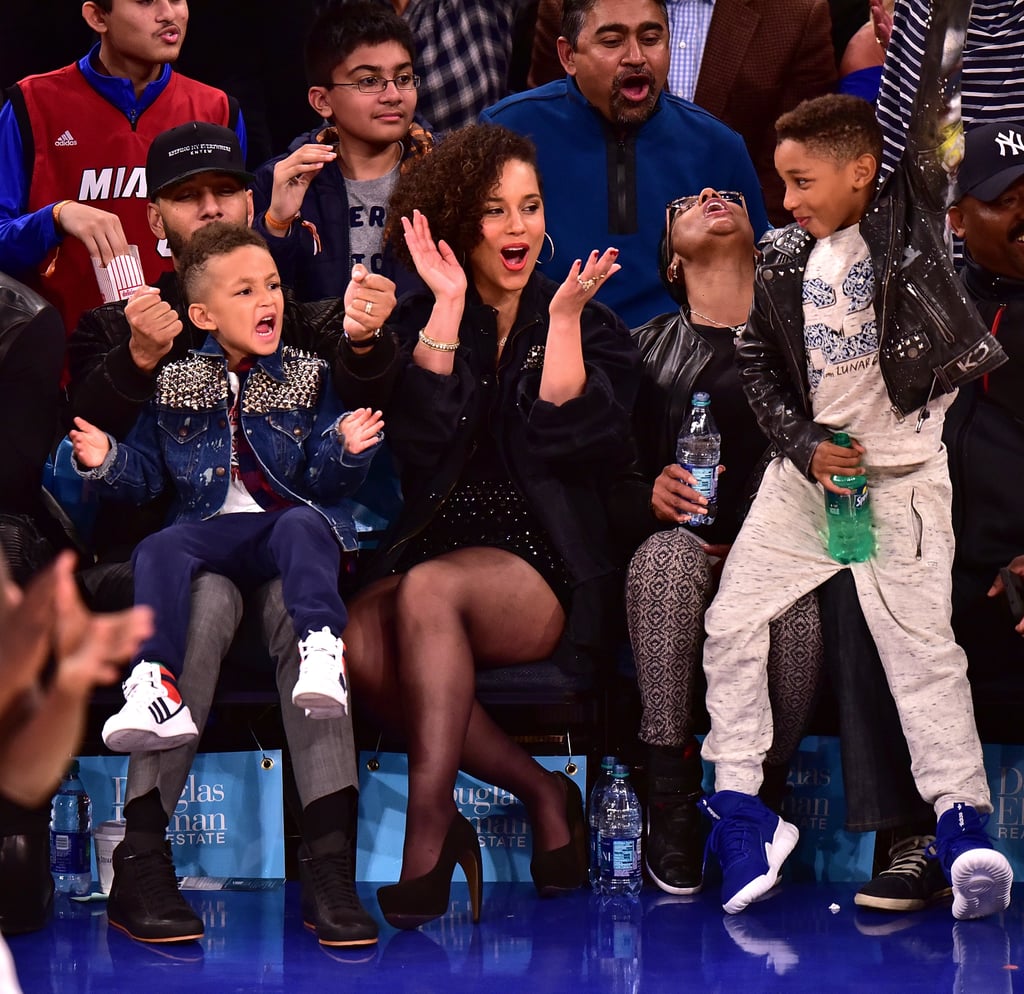 Alicia Keys attended the New York Knicks game in NYC on Friday with her husband, Swizz Beatz, their son Egypt Dean, and her stepson, Kasseem Dean Jr. The famous brood sat courtside together and could not contain their excitement over the match. Whether they were smiling, laughing, or being serious, Alicia and her family showed us just how truly invested they were in the game, adding to their ongoing list of sweet family moments. Earlier this month, Egypt put on quite the show when he and his father stepped out at yet another New York Knicks game. Read on for more photos from Alicia's family outing, and then check out even more pictures of celebrities freaking out at sports events.