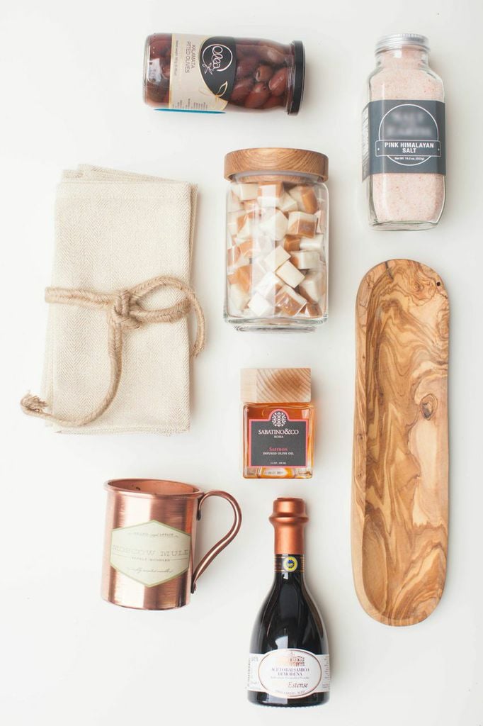 Check out all the other delightful pieces you can look for at your local HomeGoods. (How great is that wooden tray?)  

 Natural wooden appetizer tray ($17) 
Aged balsamic vinegar ($13)
 Kalamata olive jar ($9) 

Source: Style Me Pretty
