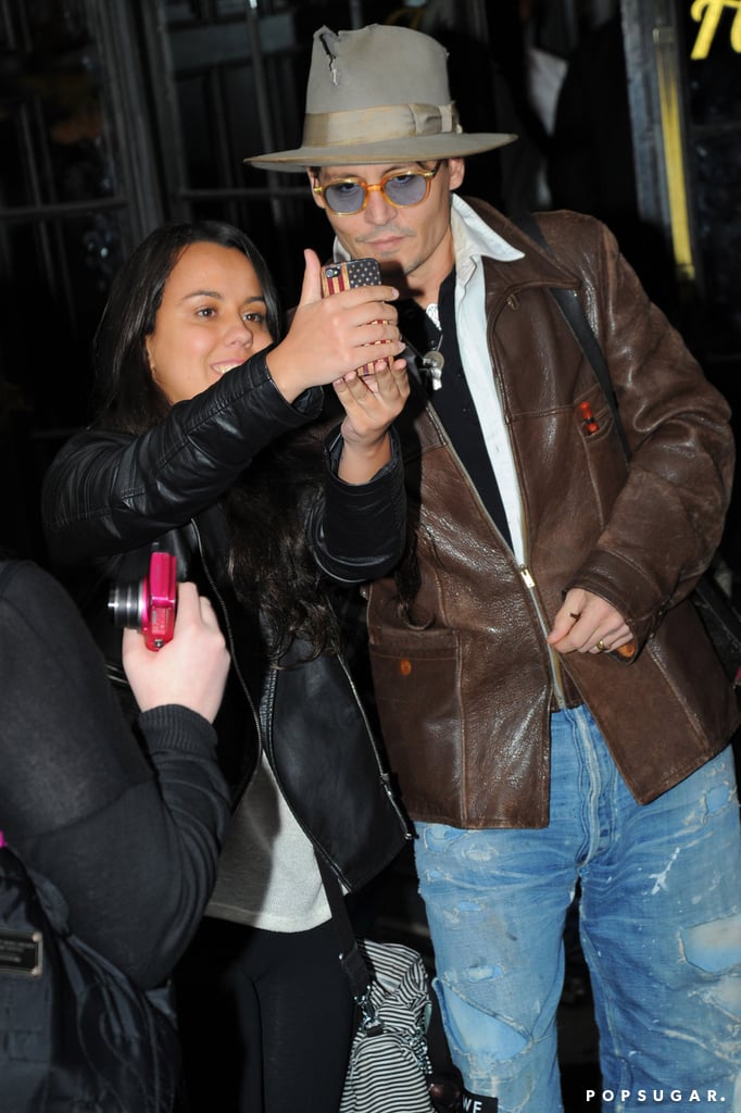 Johnny Depp stopped for a photo while out in NYC in April 2014.
