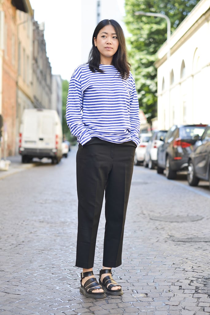 Chunky sandals give a simple stripe top and black pants a modern feel.