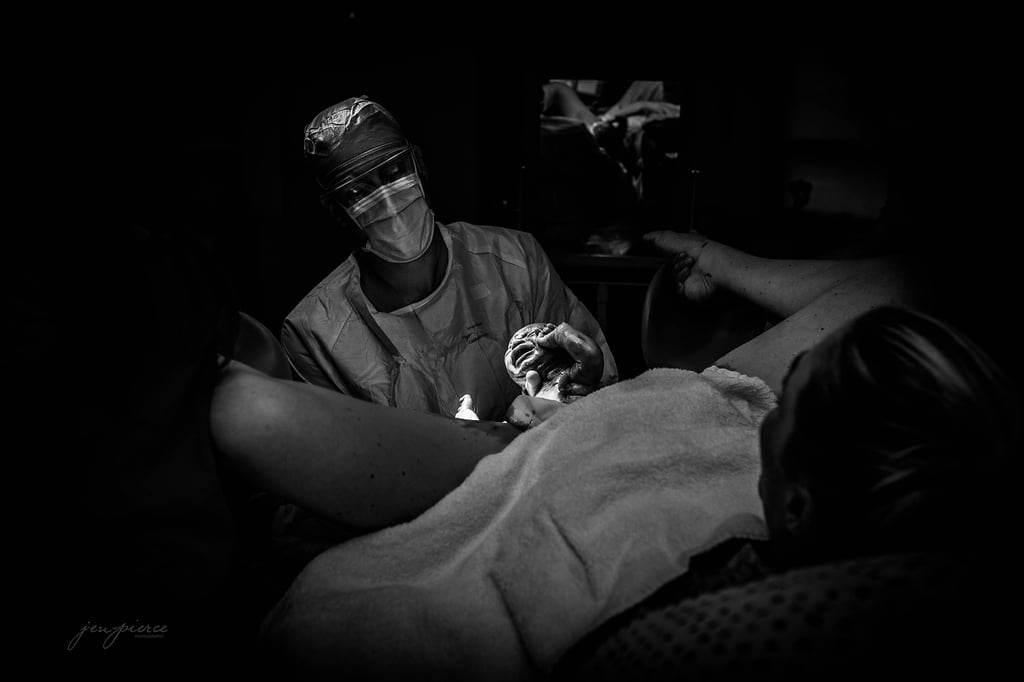 Birth Photographer's Photo of Family in the Waiting Room