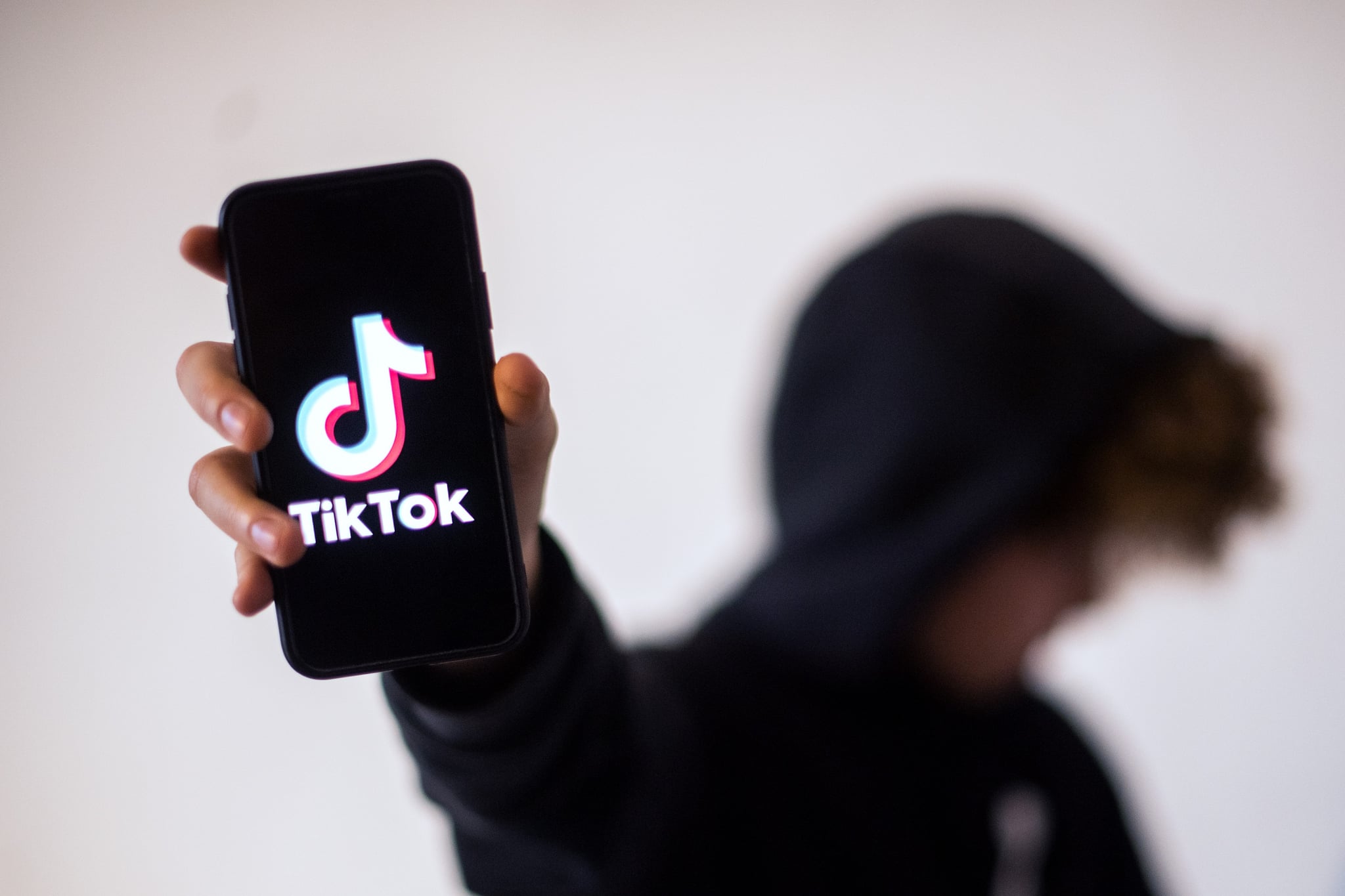 A teenager presents a smartphone with the logo of Chinese social network Tik Tok, on January 21, 2021 in Nantes, western France. (Photo by LOIC VENANCE / AFP) (Photo by LOIC VENANCE/AFP via Getty Images)