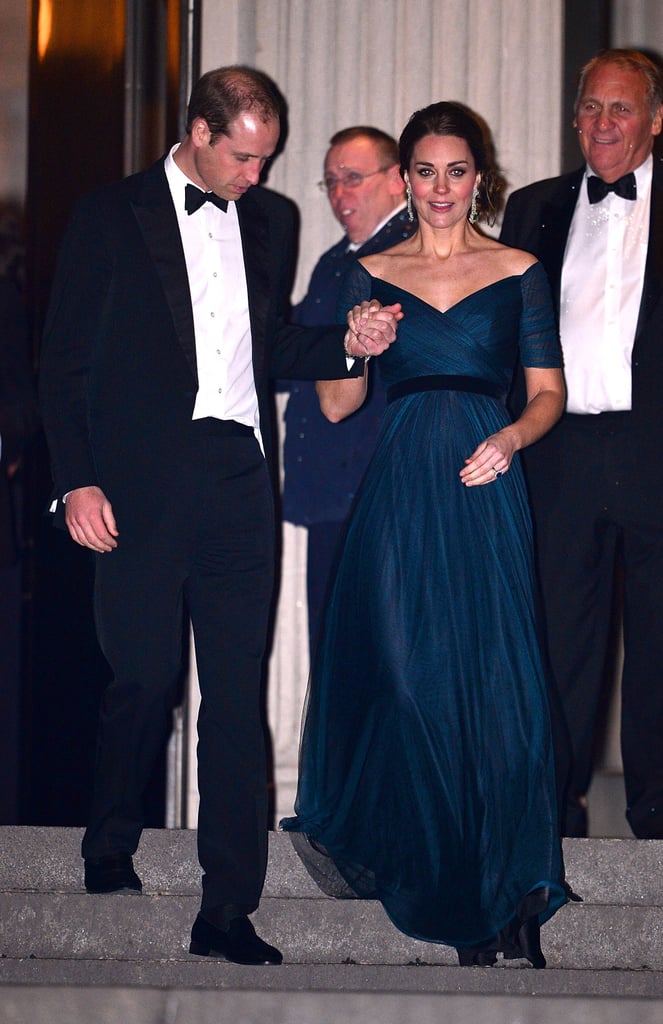 In Dec. 2014, while pregnant with Princess Charlotte, Kate chose a navy Jenny Packham gown for the University of St. Andrews' 600th Anniversary Dinner at the Met. The deep blue dress hugged her baby bump, and she accessorised with some sparkly diamond and emerald drop earrings.