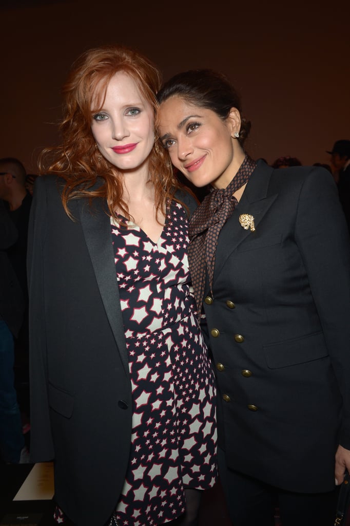 Jessica Chastain and Salma Hayek were two peas in a pod at the Saint Laurent show during Paris Fashion Week on Monday.