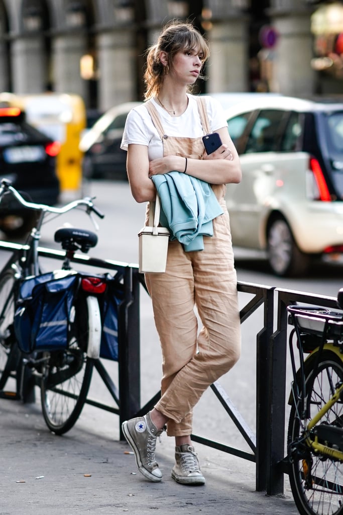 Pair your overalls with a white tee and high-tops.