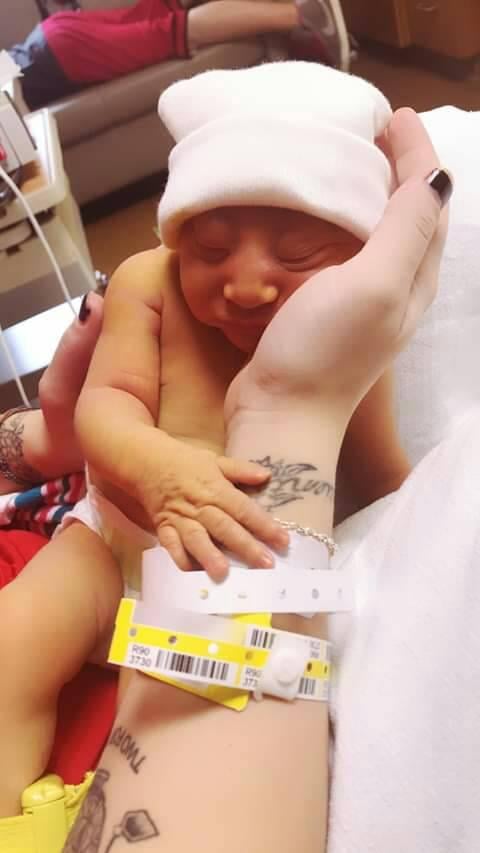 Rylei was born on Christmas Eve, and even though Krysta and Derek knew they didn't have a lot of time with their child, they instantly fell in love.
"At 5:04 p.m., we welcomed this beautiful little girl into the world," Krysta wrote on Facebook. "Rylei Arcadia Diane Lovett came out 19 inches long weighing 6 pounds even. She has amazed me from the moment I saw her little face. I am so in love with my daughter and I am so grateful to all of the people who shared this day with her."
Despite the fact that Rylei had some breathing problems, she defied the odds and was even breastfeeding regularly. "I cannot help but to be amazed as I look at the little girl lying beside me," said Krysta. "She has shown me what true love is in such a short amount of time."