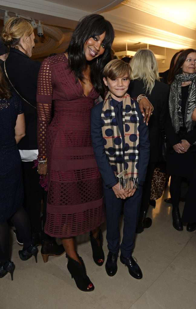 Socializing with supermodels? Romeo took a second to pose with Naomi Campbell.