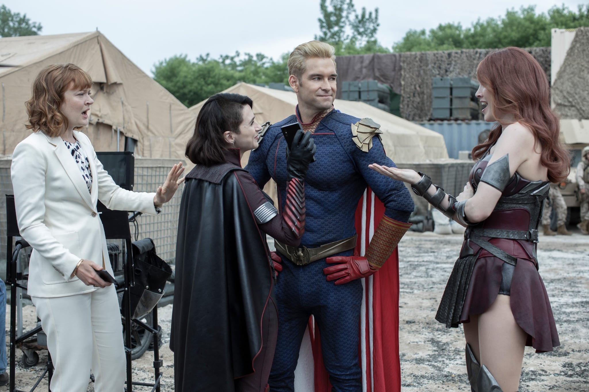 THE BOYS, Colby Minifie (left), Antony Starr (2nd from right), Dominique McElligott (right), The Big Ride, (Season 2, ep. 201, aired Sep. 4, 2020). photo: Jasper Savage / Amazon / Courtesy Everett Collection