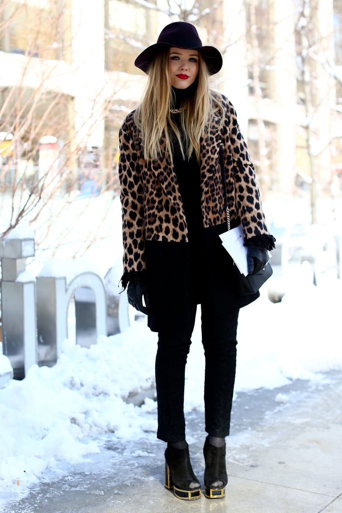 Use the leopard coat to add glamour. Not only does it lend sophistication, but also, it helps break up an all-black outfit.