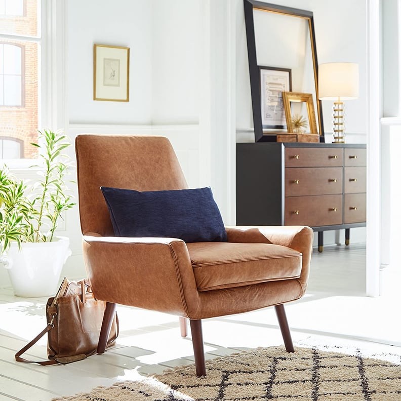 An Accent Chair: Rivet Jamie Leather Mid-Century Modern Low Arm Accent Chair