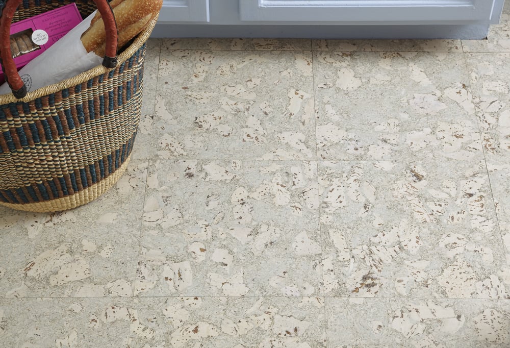 After
This incredible design remind me of Italian marbleized paper. And cork is so soft and giving when I’m standing washing dishes. Megan installed it herself and says the process is supereasy. “In addition to being both durable and beautiful, this cork flooring is easily cut with a utility knife and then glued down with contact cement,” she says. “It’s literally a cut-and-paste install!”