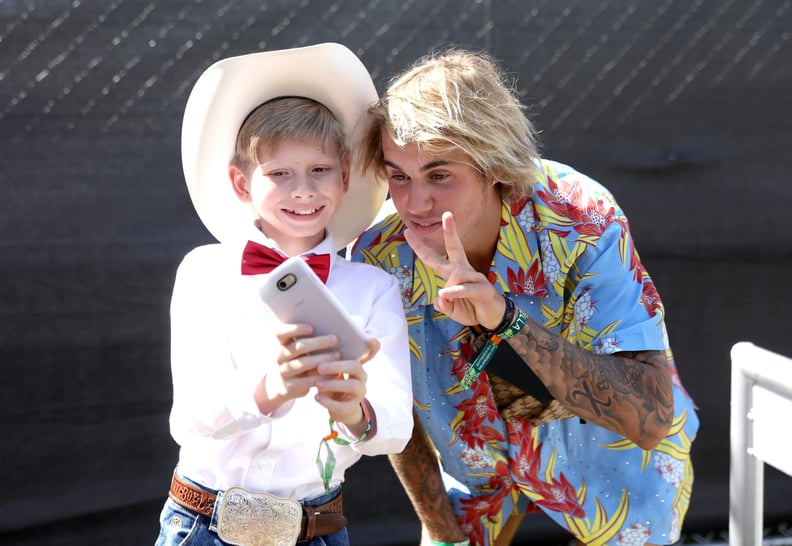 INDIO, CA - APRIL 13:  Viral internet sensation Mason Ramsey aka The Walmart Yodeling Boy, (L) and Recording Artist Justin Bieber pose for a selfie backstage during the 2018 Coachella Valley Music And Arts Festival at the Empire Polo Field on April 13, 20