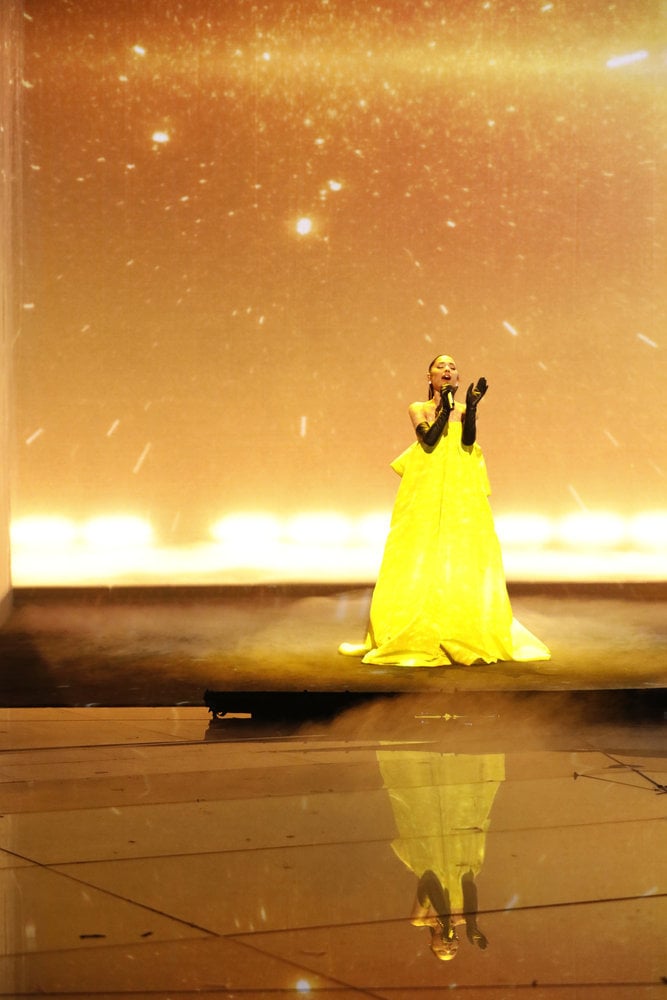 Ariana Grande wears a yellow dress made her the belle of the ball - Vogue  Australia