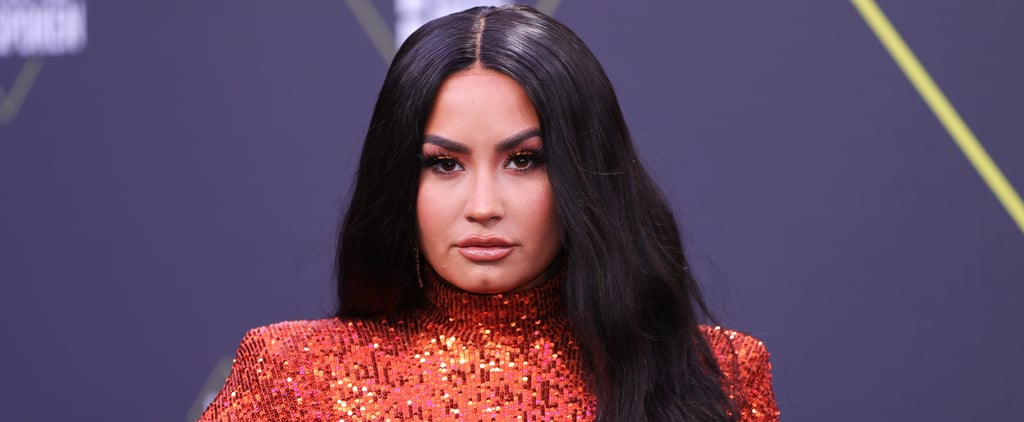 Demi Lovato's Red Leather Jacket and Plaid Skirt