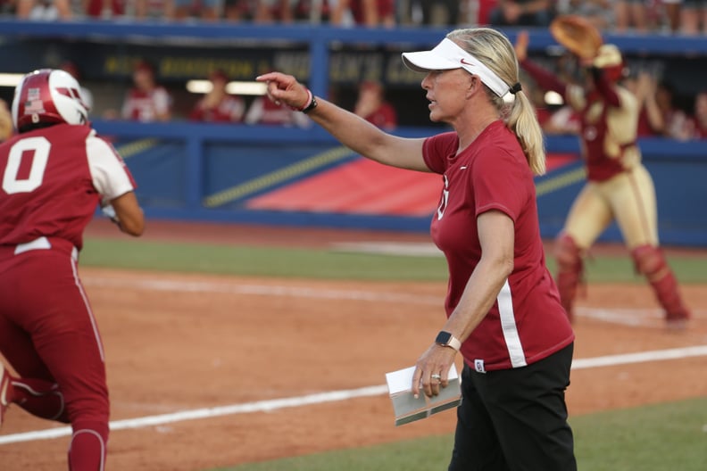 OKLAHOMA CITY, OK - JUNE 09: Head coach Patty Gasso of the Oklahoma Sooners directs her team from the third base line during the Division I Women's Softball Championship held at ASA Hall of Fame Stadium on June 9, 2021 in Oklahoma City, Oklahoma. (Photo b