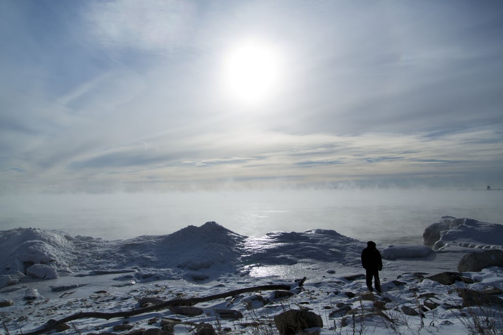 A man in Milwaukee, WI, walked along the shore of Lake Michigan.