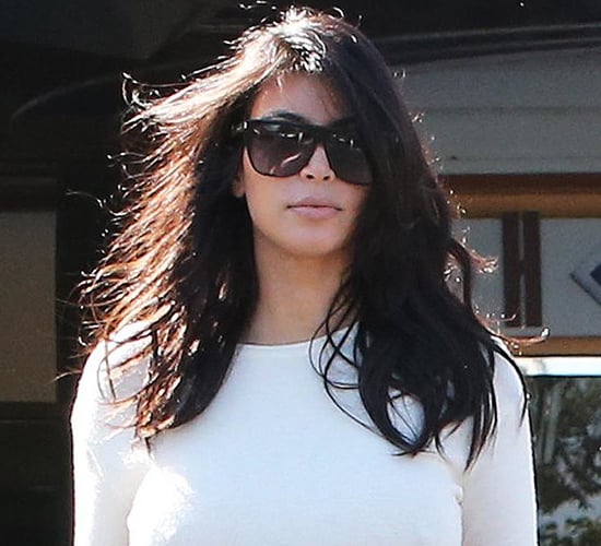 Kim Kardashian in a Backless White Shirt | Photos
