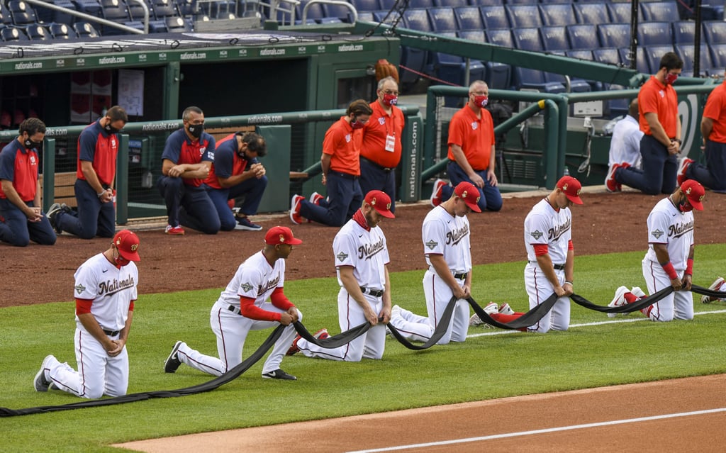 See MLB Players Kneel For Racial Justice on Opening Day