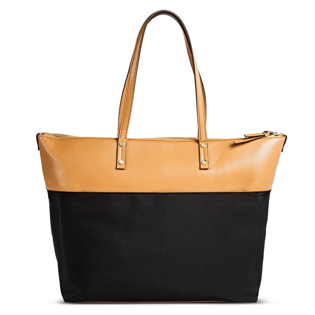 <product href="http://www.target.com/p/women-s-color-block-nylon-work-tote-with-faux-leather-trim-black-merona-153/-/A-50094830">Merona Color Block Nylon Work Tote</product> ($50)</p>