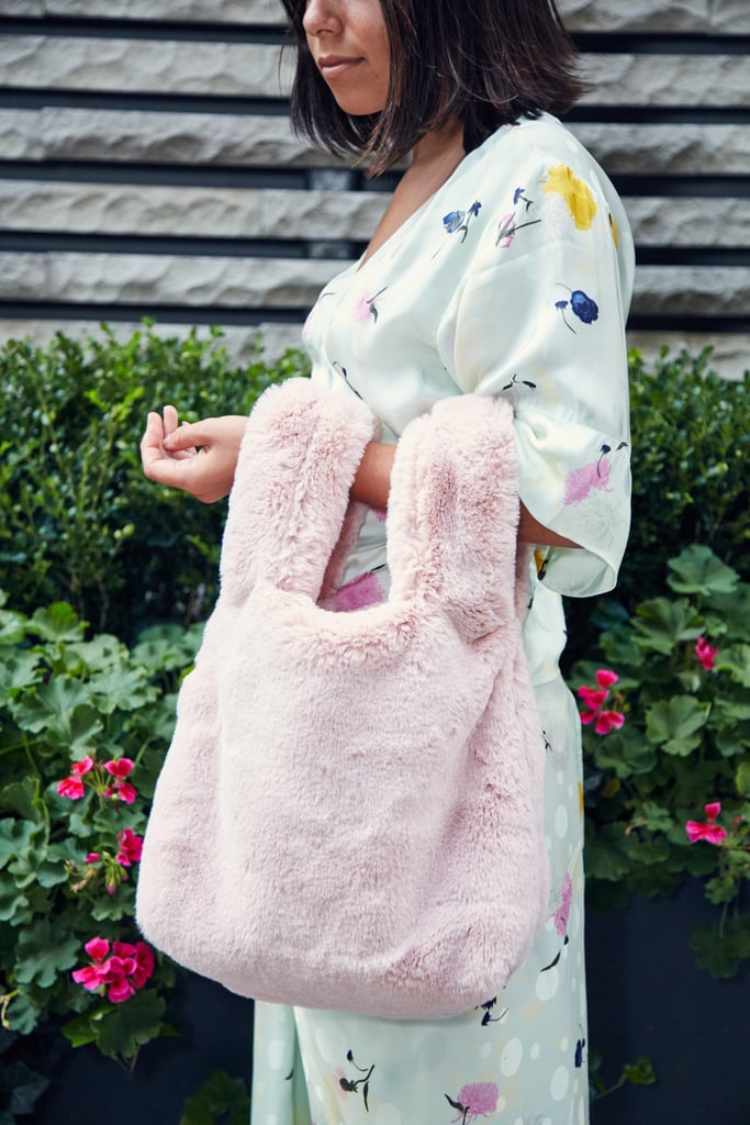 I was especially excited about this faux-fur bag from Topshop. The powder pink shade is totally girlie, and you can either hold it like a shopper or loop one strap through the other, creating a hobo shape (which is how I prefer it styled).
Outfit total: $380