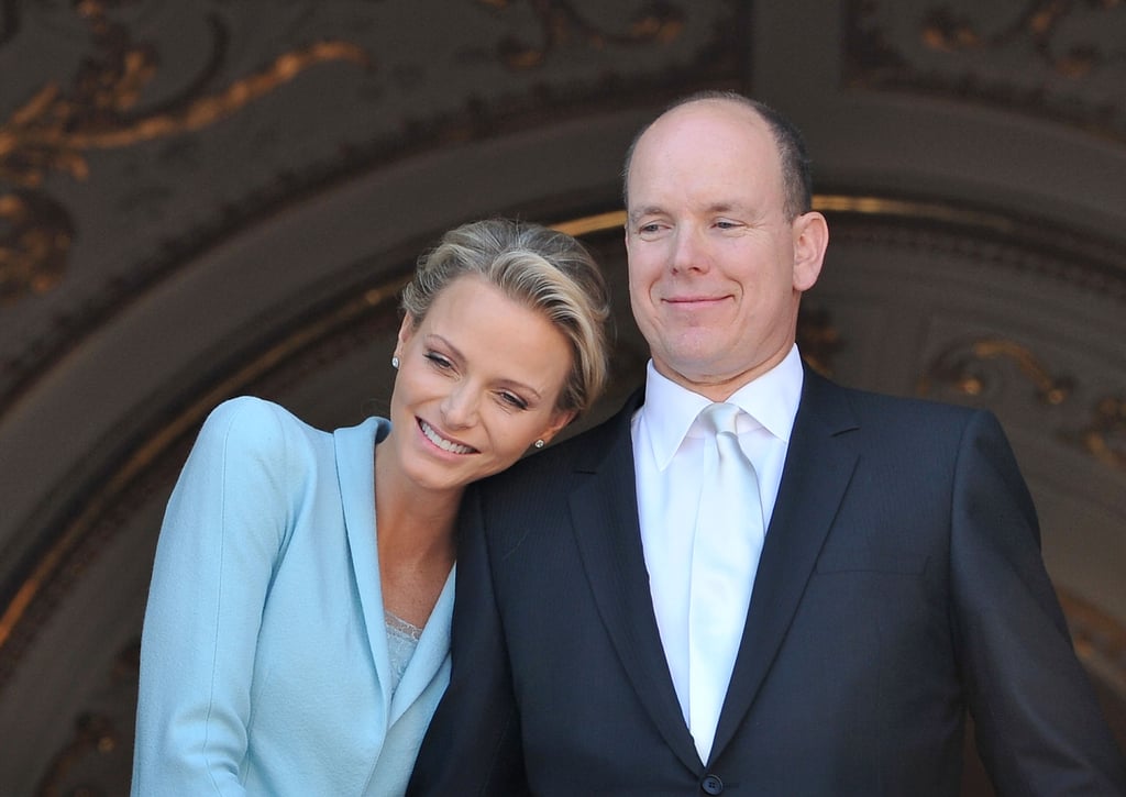 They had two weddings. Charlene and Albert first said "I do" in a civil ceremony in the Throne Room of the royal palace on July 1, 2011, and then again the following day in a religious ceremony.
Charlene created her "something blue." For the civil ceremony, Charlene wore a blue suit, which she later revealed was a collaboration between her and Karl Lagerfeld. "We wanted something to match the color of my eyes. It is my creation, and I’m proud of it. It’s feminine and keeps with tradition, yet has a little twist that reflects my personal style," she told Vogue in 2011. "I thought it was a nice change to go for trousers instead of a skirt, especially since I’m an athlete and have always kept my clothes clean and simple." The blue color has since been referred to as "Charlene Blue."