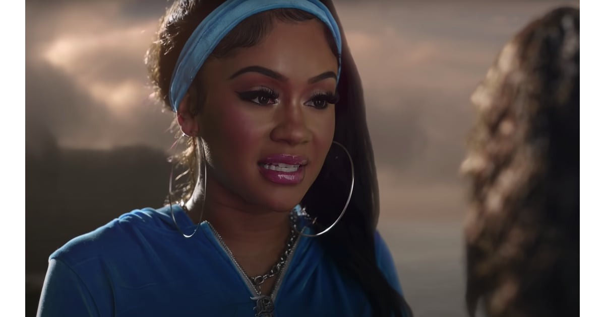 Saweetie wearing a blue velour "Best Friend" jacket and short sets by