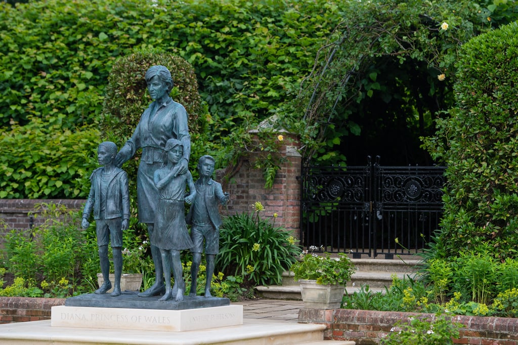 The Princess Diana Statue in The Sunken Garden at Kensington Palace Princes William and Harry