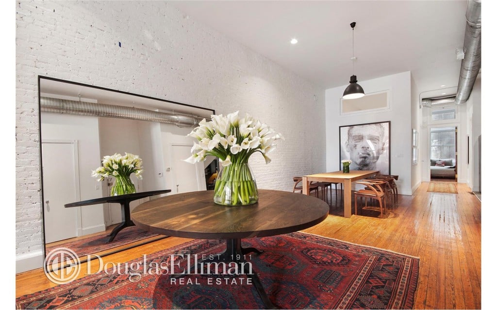 The A-list actor is greeted in the entranceway by soaring ceilings and beautiful, exposed-brick walls.