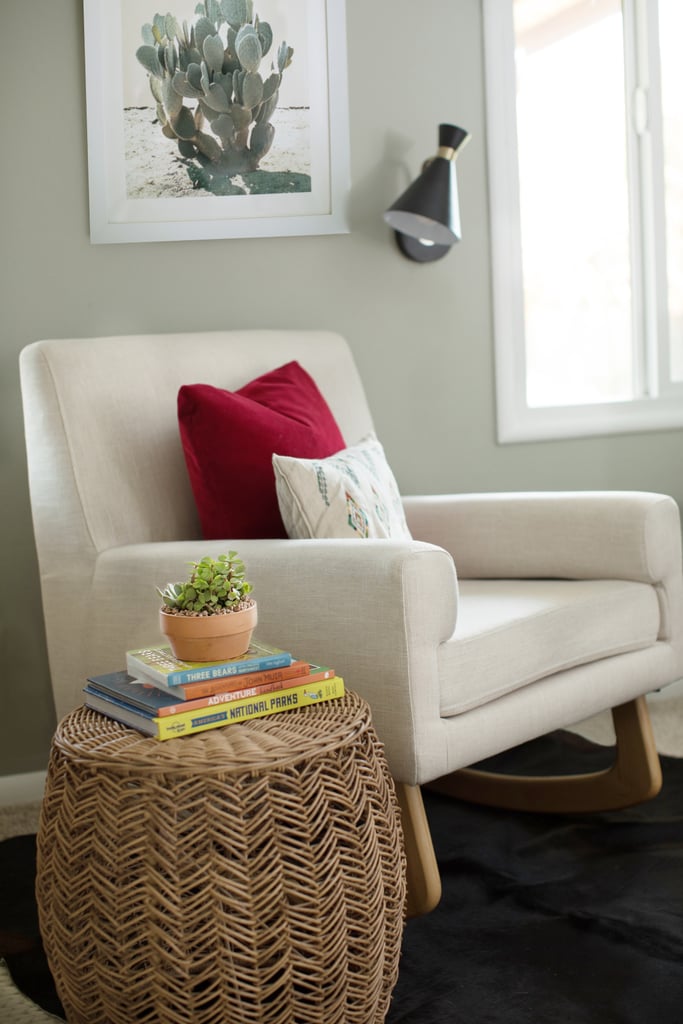 Instead of having our blue club chair against the larger wall next to the closet, Briana placed this cream-coloured rocking chair ($500) in the more narrow space between the windows. This freed up the wall next to the closet for another piece of storage furniture.