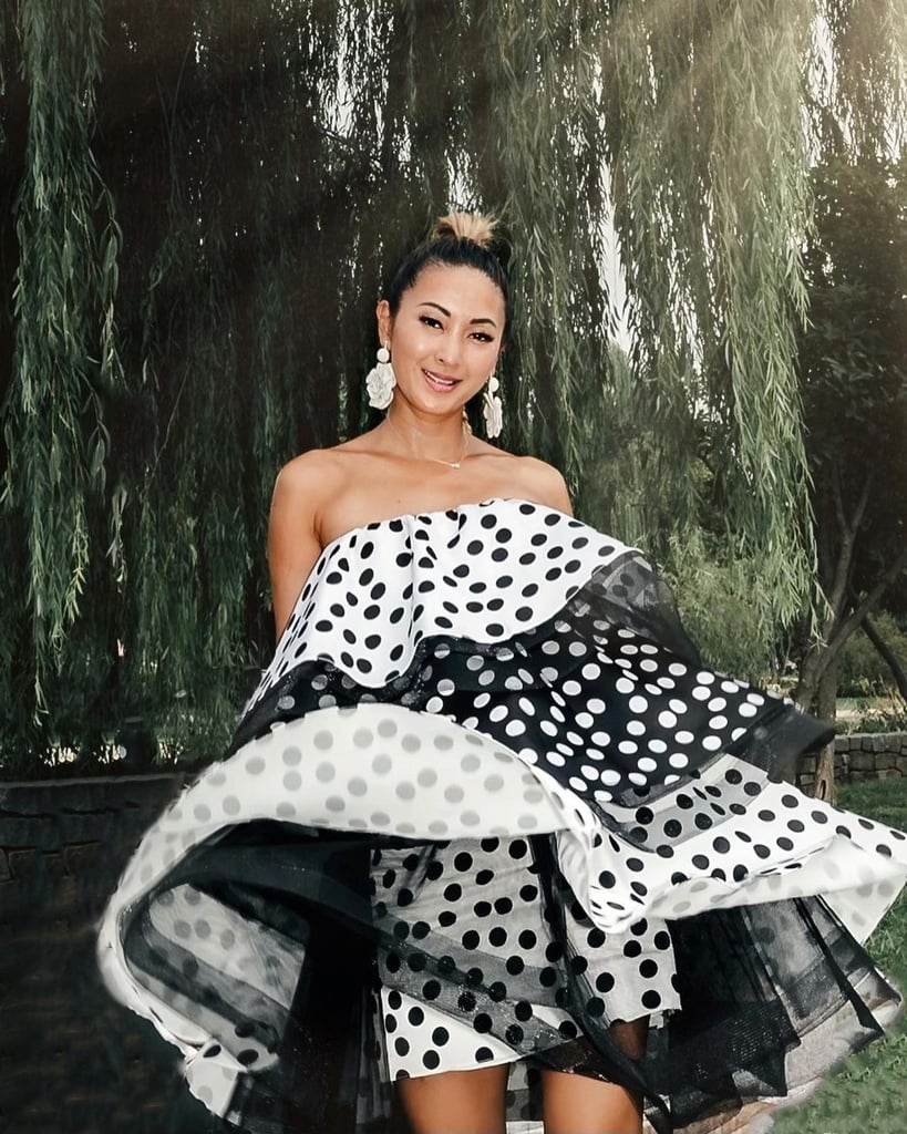 "It's wonderful to know that someone else can make use of my pieces and give them the light they deserve."
Digital creator, stylist, and photographer Anchyi Wei has loaned out 15 items since she joined Tulerie and has made around $2,000 from rentals and sales. She rented this Carolina Herrera tiered polka-dot dress for a picnic with friends and ended up distinguishing the dress code as black and white all because of it. "I'm a big believer in circular economy and believe this is the way of the future. As a loaner, it's wonderful to know that someone else can make use of my pieces and give them the light they deserve," she said, counting the first-ever rental of her yellow Viva Aviva top as particularly memorable. "I was so excited to share my closet, and hoped the renter looked amazing in it!" Wei prefers Tulerie to other apps because of the quality of inventory and the helpful members in the community, confirming that she's earned much higher commission in comparison to other sites. But most importantly, there's the consideration for the environment. "From a sustainability standpoint, the Earth is not made of unlimited resources, and there is no sense in overproducing and waste generation when we can collectively share a few high-quality goods."