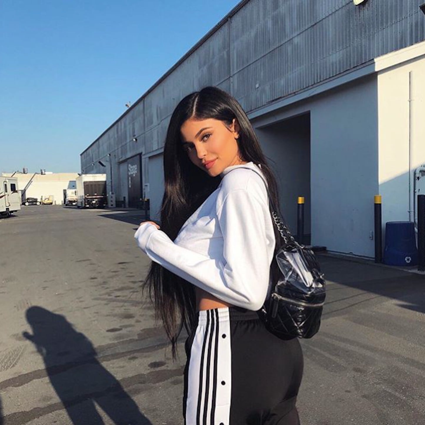 Kylie Jenner Totes White Vintage Chanel Backpack in Retro Sneakers