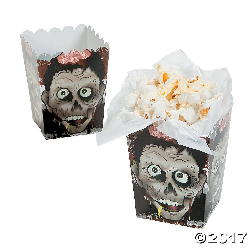 Dole out individual servings of food, like popcorn, in personal Zombie Head Mini Boxes ($6 for 24).