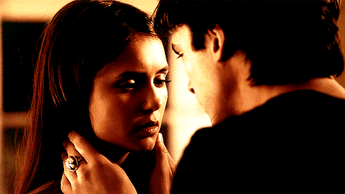 When Damon gears up to kiss her.