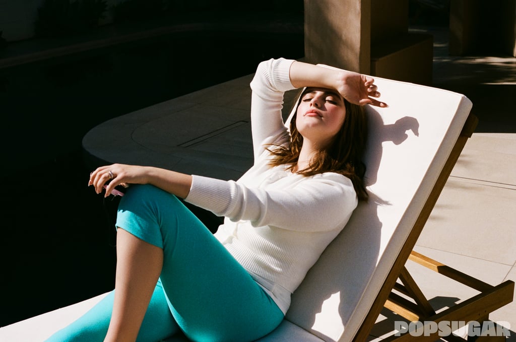 525 America Anne High Waist Rib cardigan ($89). Gil Rodriguez Aqua capri leggings ($105). Jenny Bird Art Heart Button earrings ($138). Luv AJ The Sierra Split ring ($60).
Bright's fitted cardigan and teal capri pants embody '50s fashion at its most flirtatious. Add flip-flop heels and a tiny handbag and you're ready for your next day date.
Get The Look: H&M Fine Knit Cardigan ($30). Edikted Adara Tie Capri Pants ($53). ChicSilver Heart-Gold Earrings ($27). Baublebar Moxie Ring ($40).