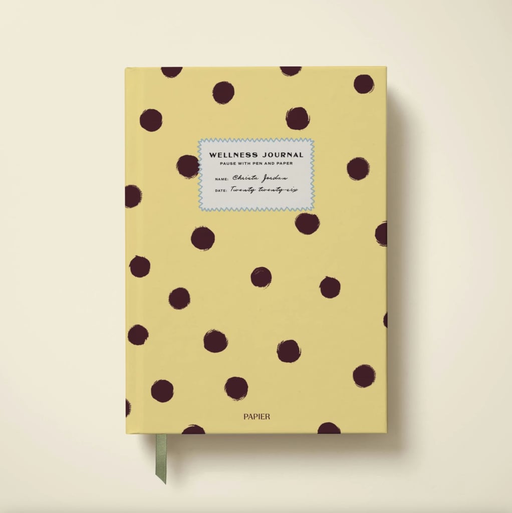 Papier Dotted & Spotted Wellness Journal ($35)
Damson Madder x Papier is the dream. I have loved Damson Madder's whimsical brand a lot the past few years, and I'm thrilled to see them expanding into stationery with their signature butter yellow-and-brown polka-dot pattern.