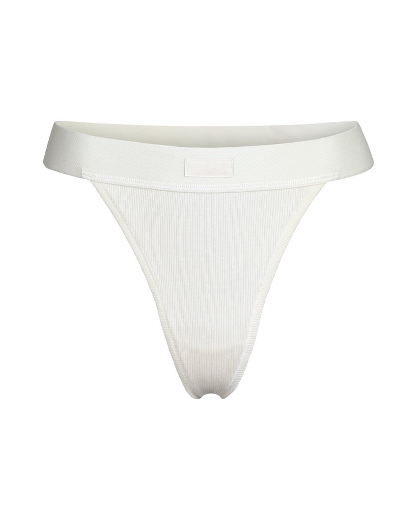 Skims Cotton Ribbed Thong in Bone