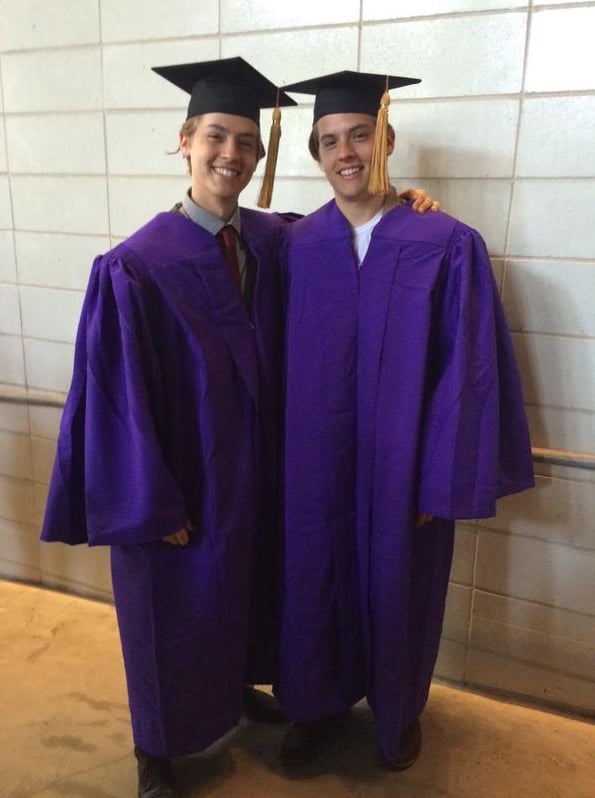 Dylan and Cole posed for a picture in their caps and gowns.