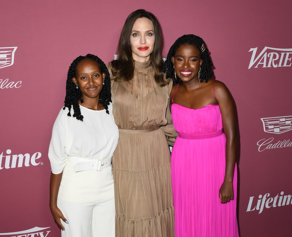 Zahara Jolie-Pitt had quite the star-studded night out with mom Angelina. On Thursday, the 16-year-old attended Variety's Power of Women event in LA, where she walked the red carpet with poet Amanda Gorman and mingled with the likes of Katy Perry and Orlando Bloom. Zahara looked gorgeous in an all-white ensemble, while Amanda dazzled in a bright pink dress. 
During the dinner, Angelina delivered a powerful speech honoring the fearless poet. "The young woman of grace, who stepped fearlessly to the podium on Inauguration Day. Not just the youngest but the strongest voice we could ask for in that moment. The Amanda we see today might seem as if she leapt into our times, fully formed, to summon our better angels. But there was an Amanda we didn't see," Angelina said. "So as well as celebrating your extraordinary achievements, Amanda, we honor 7-year-old you, and every other girl who feels she is an outsider, alone, when she is simply coming into her own."
The last time we saw Zahara on the red carpet was back in October 2019 at the European premiere of Maleficent 2. Ahead, see more of her glamorous night out ahead. 

    Related:

            
            
                                    
                            

            Watch Angelina and Brad&apos;s Kids Grow Up Before Your Eyes in These 25 Pictures