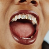 The Nuanced History Behind Tooth Gems, Beauty's Latest 