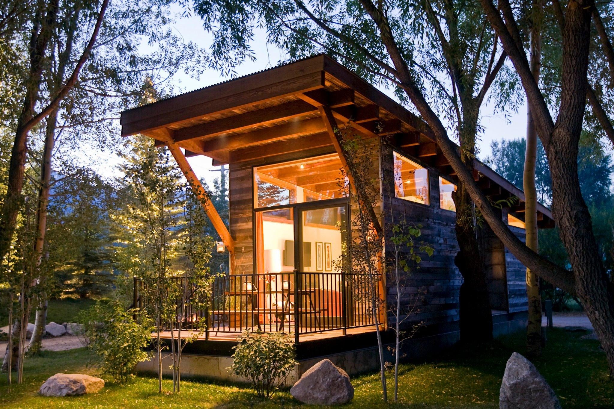 Aptly Named The Wedge This Chic Cabin Features Large Windows To