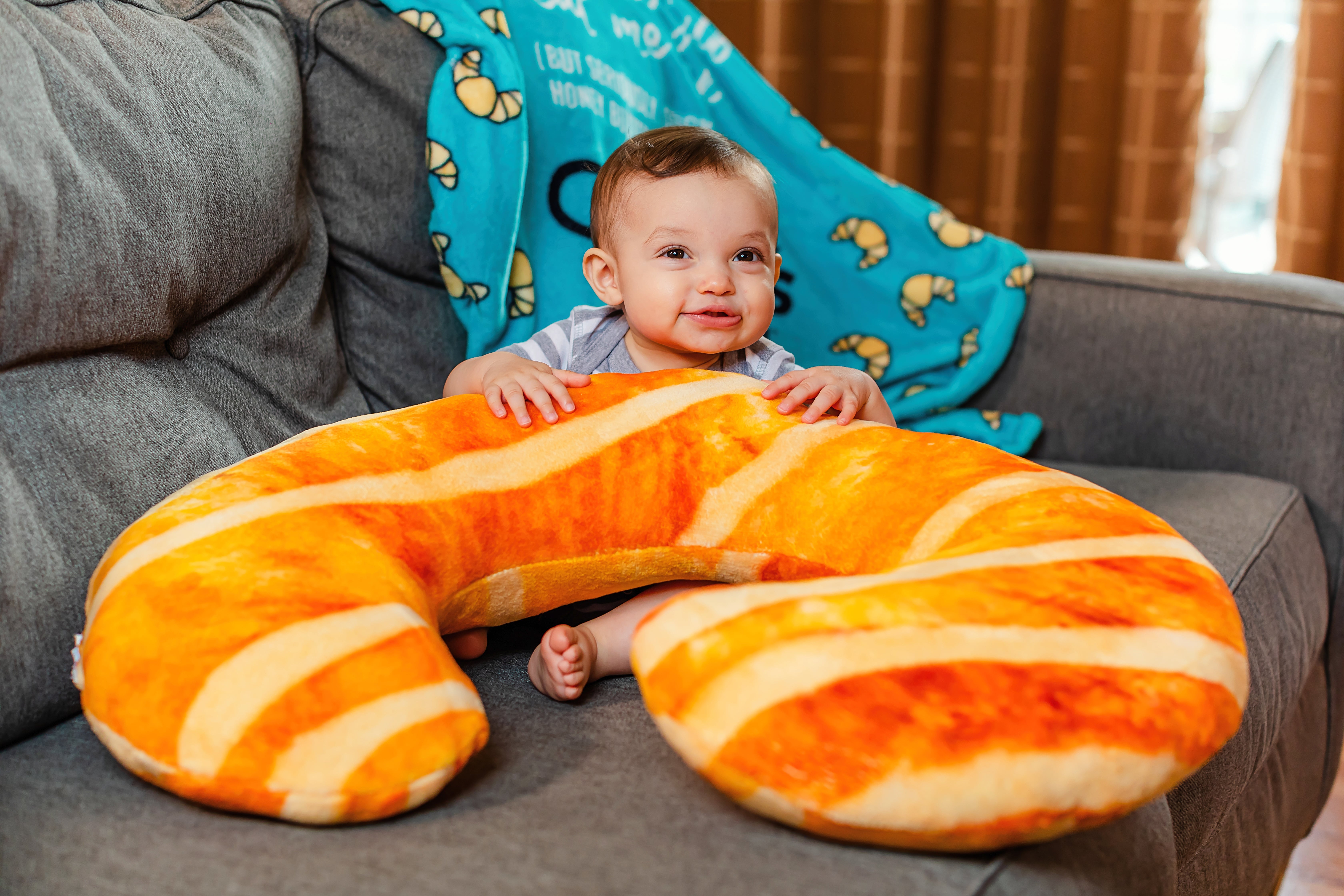 This Giant Croissant Body Pillow Is Four Cozy Feet Long