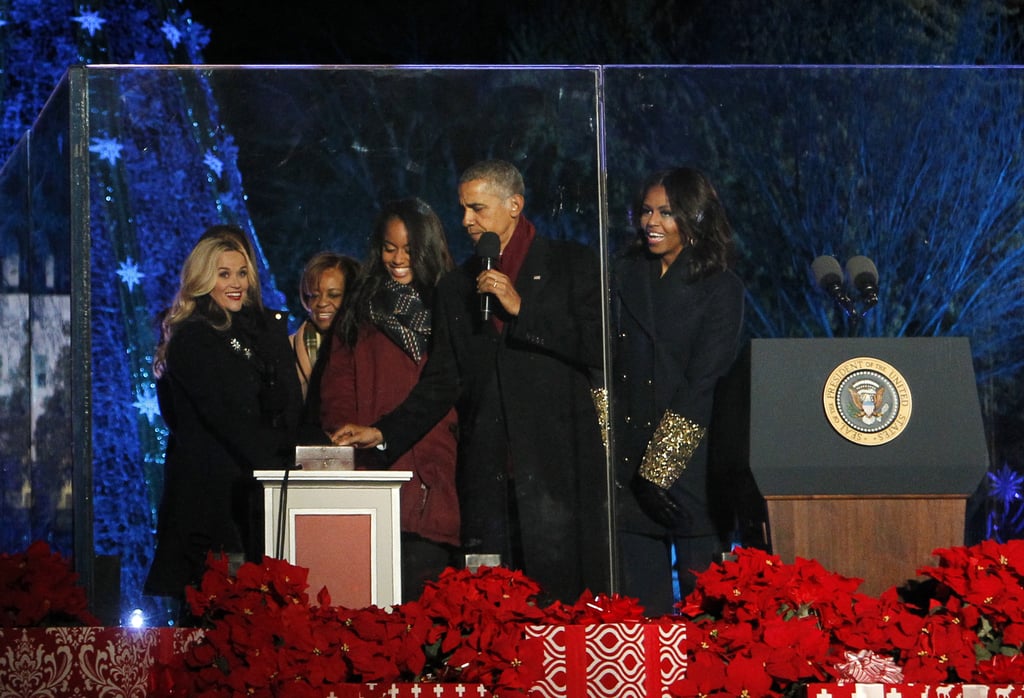 You could spot the FLOTUS's sleeves from a mile away as she took the stage with her family and Reese Witherspoon.
