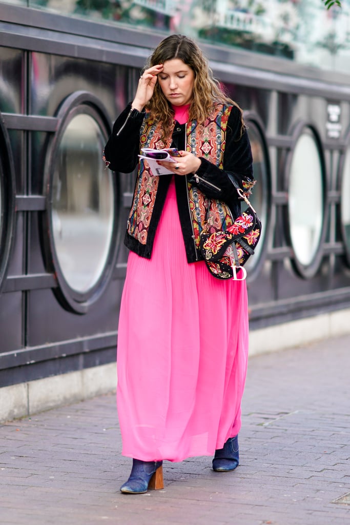 Style an embroidered jacket over a bright pink maxi dress.