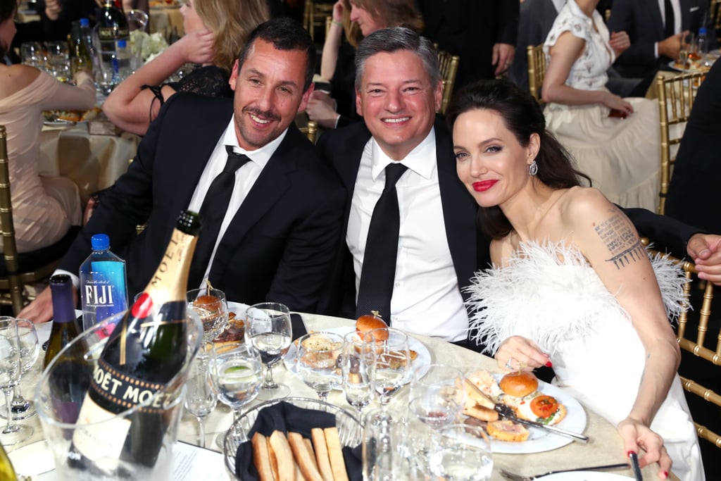 Pictured: Adam Sandler, Ted Sarandos, and Angelina Jolie
