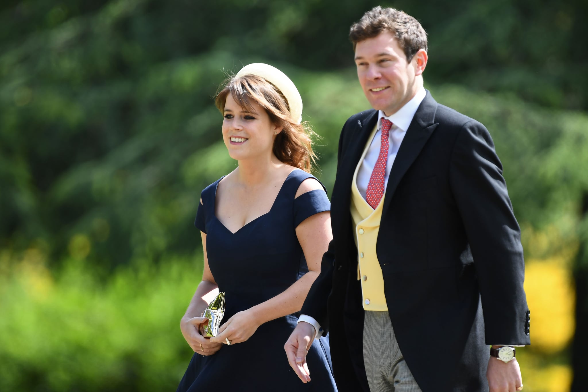 CORRECTION - Britain's Princess Eugenie of York (L) attends the wedding of Pippa Middleton and James Matthews at St Mark's Church in Englefield, west of London, on May 20, 2017.Pippa Middleton hit the headlines with a figure-hugging outfit at her sister Kate's wedding to Prince William but now the world-famous bridesmaid is becoming a bride herself. Once again, all eyes will be on her dress as the 33-year-old marries financier James Matthews on Saturday at a lavish society wedding where William and Kate's children will play starring roles. / AFP PHOTO / POOL / Justin TALLIS / The erroneous mention[s] appearing in the metadata of this photo by Justin TALLIS has been modified in AFP systems in the following manner: [Britain's Princess Eugenie of York] instead of [Britain's Princess Beatrice of York]. Please immediately remove the erroneous mention[s] from all your online services and delete it (them) from your servers. If you have been authorized by AFP to distribute it (them) to third parties, please ensure that the same actions are carried out by them. Failure to promptly comply with these instructions will entail liability on your part for any continued or post notification usage. Therefore we thank you very much for all your attention and prompt action. We are sorry for the inconvenience this notification may cause and remain at your disposal for any further information you may require.        (Photo credit should read JUSTIN TALLIS/AFP/Getty Images)