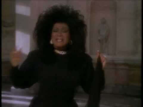 Crazy Hairstyles Seem to Be a Theme in Bond-Song Videos