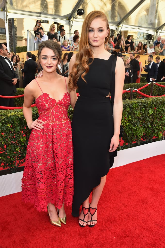 Maisie Williams (Arya Stark) and Sophie Turner (Sansa Stark)