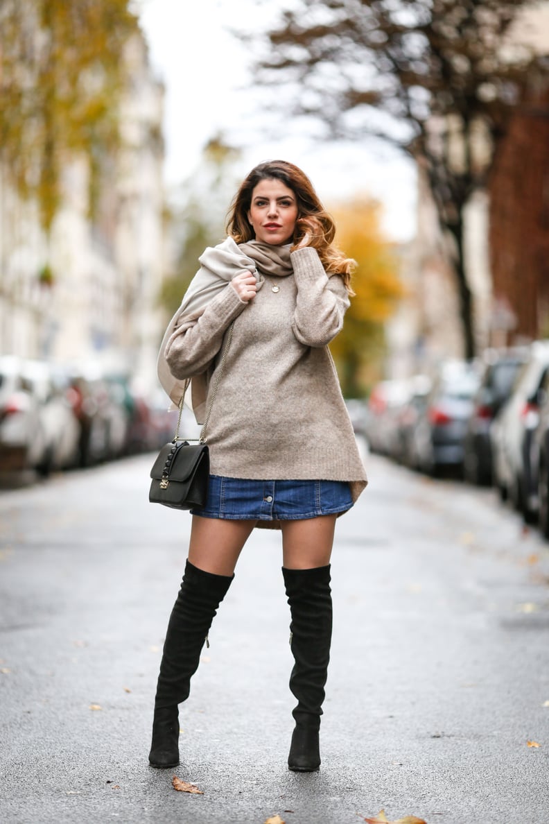 Style a Denim Mini With Thigh-High Boots and a Long Sweater